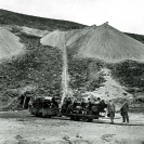 Sightseers on mine railroad 1927. Major Boyd standing near locomotive at Grand View Mine - Courtesy National Park Service, Death Valley National Park