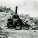 Old Dinah steam tractor built by Best of San Leandro, Calif. Cost $4,500 each, 250 pounds of coal per hour, 3.5 miles per hour. Used one year, Borate to Daggett 1901, then to Ivanpah. Broke down after 3 miles. In 1906 towed back to Ludlow and sold. - Courtesy National Park Service, Death Valley National Park